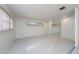 Living room with tile flooring and large mirror creating spaciousness at 507 Applewood Ave, Altamonte Springs, FL 32714