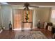 Spacious living room featuring a sliding glass door and ample natural light at 5904 Bolling Dr, Orlando, FL 32808