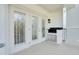 Balcony with white doors and built in grill at 630 Vassar St # 2310, Orlando, FL 32804