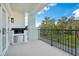 Private balcony with built-in grill and park views at 630 Vassar St # 2310, Orlando, FL 32804