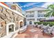 Outdoor stone fireplace and seating area at 630 Vassar St # 2310, Orlando, FL 32804