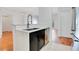 Modern kitchen island with sink and stainless steel faucet at 630 Vassar St # 2310, Orlando, FL 32804