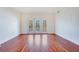 Spacious living room featuring hardwood floors and large windows at 630 Vassar St # 2310, Orlando, FL 32804