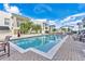 Community swimming pool with lounge chairs at 630 Vassar St # 2310, Orlando, FL 32804