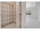 Spacious walk in closet with built in shelves and a large window at 630 Vassar St # 2310, Orlando, FL 32804