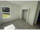 Bright bedroom with tile floors and a double-door closet at 6365 Sw 156 Th St St, Ocala, FL 34473