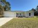 Newly built home with a two-car garage, and front landscaping at 6365 Sw 156 Th St St, Ocala, FL 34473