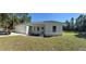 Charming single-story home with a two-car garage and landscaped yard at 6365 Sw 156 Th St St, Ocala, FL 34473