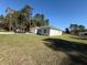 Single story home with a large yard and driveway at 6365 Sw 156 Th St St, Ocala, FL 34473
