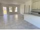 Open concept living room and kitchen with tile flooring at 6365 Sw 156 Th St St, Ocala, FL 34473