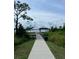 Lakeside walkway with gazebo and scenic views at 7100 Cherry Pasture Rd, Groveland, FL 34736