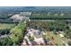 Aerial view of property and surrounding land, showcasing its expansive size and privacy at 10750 Sw 110Th St, Dunnellon, FL 34432