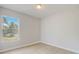 Spacious bedroom with large window and hardwood floors at 11513 Robbyes Dr, Orlando, FL 32817