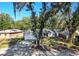 Aerial view of a gray house with a white garage door at 1253 15Th St, Orange City, FL 32763