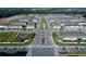 Large community of townhomes with central green space at 14914 Harvest St, Orlando, FL 32824