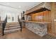 Entertaining space with a brick bar, wood accents, and convenient access to the surrounding living areas at 1504 E Robinson St, Orlando, FL 32801