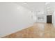Bright living room featuring neutral walls and beautiful tile flooring illuminated by recessed lighting at 1504 E Robinson St, Orlando, FL 32801