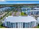 Aerial view of community with building and parking at 3151 Paradox Cir # 405, Kissimmee, FL 34746
