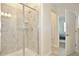 Bathroom with a large walk-in shower and modern tile at 3151 Paradox Cir # 405, Kissimmee, FL 34746