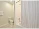 Bathroom with tub shower combination and herringbone tile at 3151 Paradox Cir # 405, Kissimmee, FL 34746