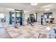 Modern fitness center featuring strength training and cardio equipment at 3151 Paradox Cir # 405, Kissimmee, FL 34746
