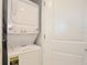 Stackable washer and dryer in a convenient laundry closet at 3151 Paradox Cir # 405, Kissimmee, FL 34746