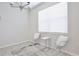Small office space with two chairs and a small table at 3151 Paradox Cir # 405, Kissimmee, FL 34746
