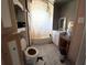 Bathroom with bathtub, toilet, and sink at 475 80 Foot Rd, Bartow, FL 33830
