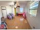 Bright bedroom with hardwood floors and ample natural light at 475 80 Foot Rd, Bartow, FL 33830