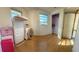 Simple bedroom with hardwood floors and a closet at 475 80 Foot Rd, Bartow, FL 33830