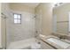 Updated bathroom with granite vanity and a bathtub at 5219 Montague Pl, Orlando, FL 32808