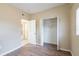 Spacious bedroom with wood-look floors and built-in closet at 5219 Montague Pl, Orlando, FL 32808