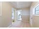 Hallway with tile flooring and access to other rooms at 5219 Montague Pl, Orlando, FL 32808