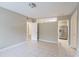 Bright and airy living room with tile floors at 5219 Montague Pl, Orlando, FL 32808