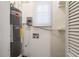 Basement utility closet with water heater and electrical panel at 5219 Montague Pl, Orlando, FL 32808