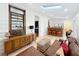 Open bar area with a wooden bar top, stools, and a wine rack at 527 Broadway Ave, Orlando, FL 32803
