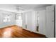 Bright bedroom with hardwood floors and ample closet space at 527 Broadway Ave, Orlando, FL 32803