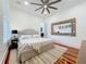 Spacious bedroom with hardwood floors and large mirror at 527 Broadway Ave, Orlando, FL 32803
