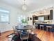 Elegant dining room with hardwood floors and chandelier at 527 Broadway Ave, Orlando, FL 32803