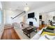 Bright living room with hardwood floors and fireplace at 527 Broadway Ave, Orlando, FL 32803