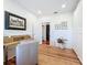 Home office with built-in desk and hardwood floors at 527 Broadway Ave, Orlando, FL 32803