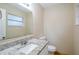 Bathroom with granite countertop and updated vanity at 5511 Indian Hill Rd, Orlando, FL 32808