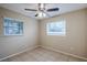 Spacious bedroom with tile flooring and ceiling fan at 5511 Indian Hill Rd, Orlando, FL 32808