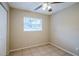 Bright bedroom with tile flooring and ceiling fan at 5511 Indian Hill Rd, Orlando, FL 32808