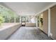 Screened porch overlooks the backyard and has access to the kitchen at 5511 Indian Hill Rd, Orlando, FL 32808