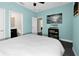 Bedroom with a full-size bed and en-suite bathroom at 618 Windy Pine Way, Oviedo, FL 32765