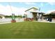 Charming outdoor cantina by the lake, offering a relaxed dining and social experience at 618 Windy Pine Way, Oviedo, FL 32765