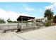 Picturesque dock on the lake, featuring a scenic view of the surrounding community at 618 Windy Pine Way, Oviedo, FL 32765
