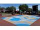 Fun splash pad area with colorful designs, perfect for Gathering entertainment within the community at 618 Windy Pine Way, Oviedo, FL 32765