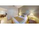 Cozy bedroom with a queen-size bed and access to a dining area at 702 Rum Run # 38702, Davenport, FL 33897
